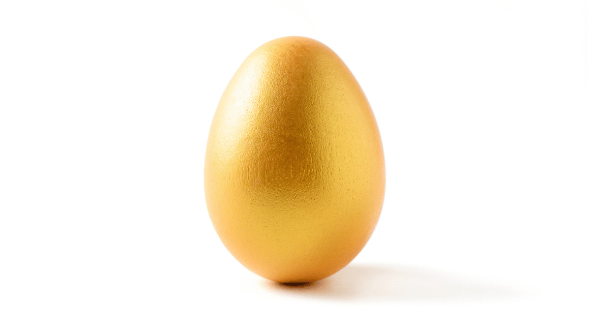 A golden egg on a white background