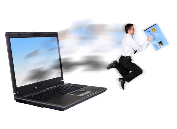 online security - businessman stealing a credit card