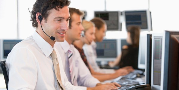 Stock Traders Working At Computers