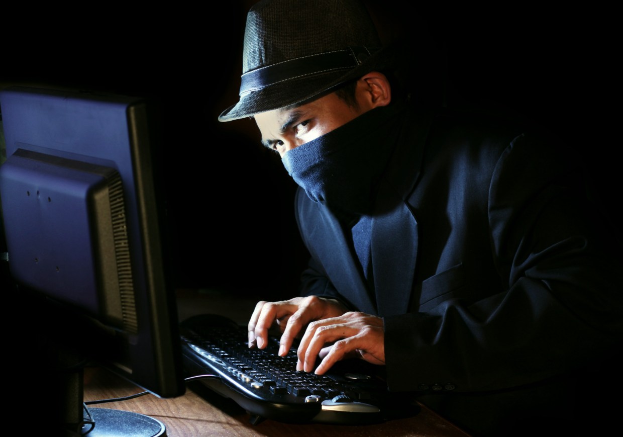 Computer Hacker Stealing Information