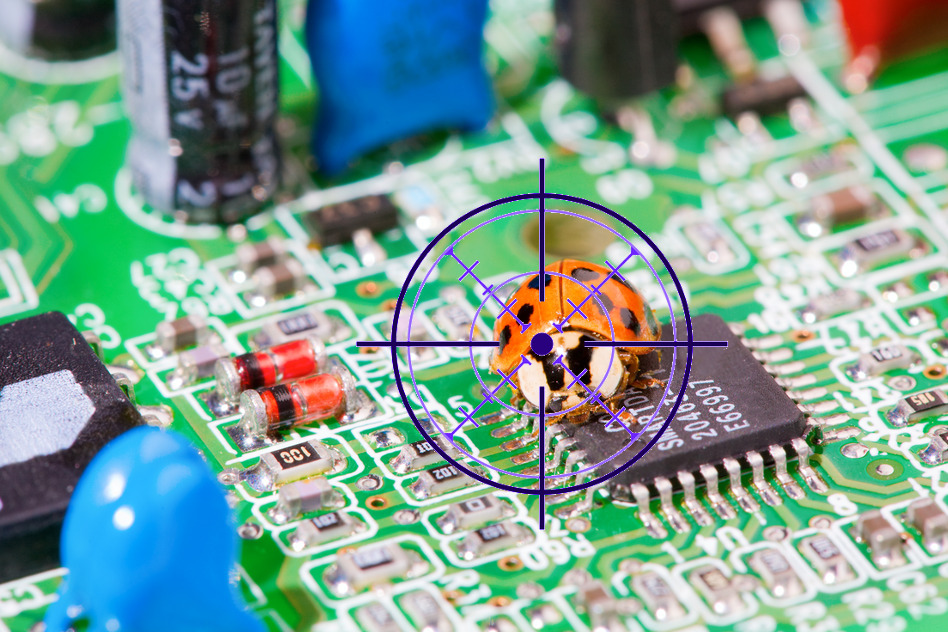 Macro image of a lady bug crawling over a microchip on a circuit board