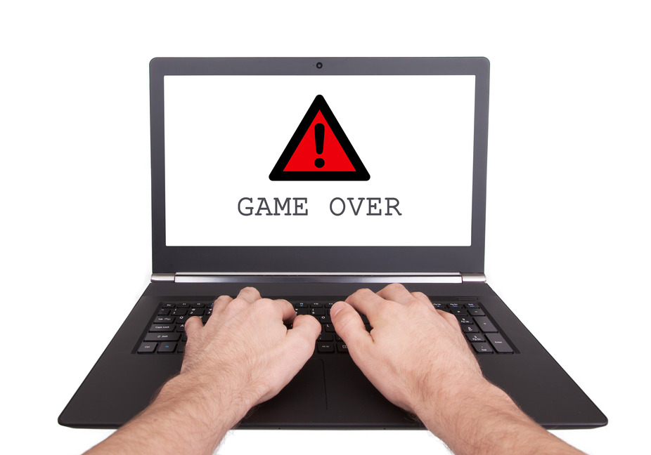 Man working on laptop, game over, isolated