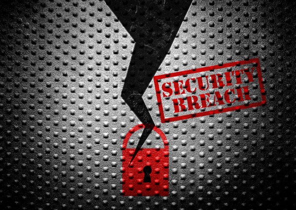 broken lock with security breach text on steel wall