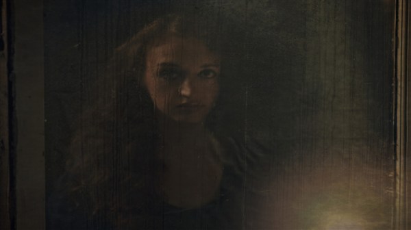 person looking at their reflection