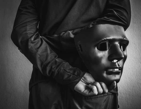 This mask is symbolic for hacker or unidentified person.