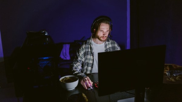 Young gamer playing a game