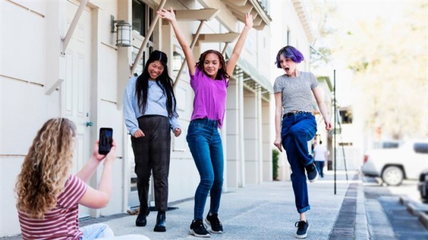 Three teens dancing on a music recording