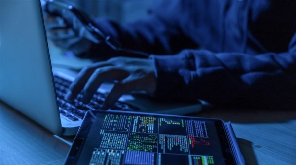 A malware author writing malware