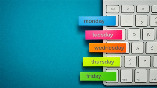 white keyboard with days of the week tags