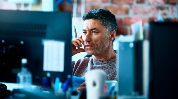 Man looking at monitor