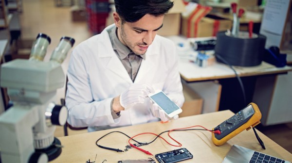 Man fixing smartphone