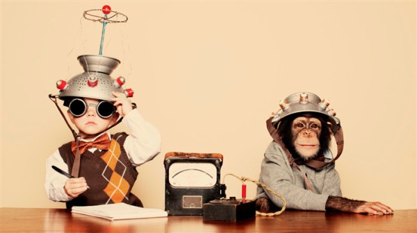 A child and a monkey with weird technology