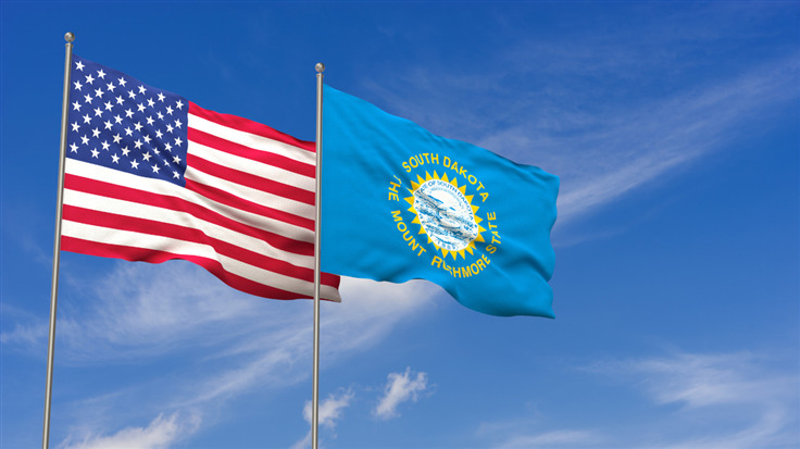 flags of the US and South Dakota