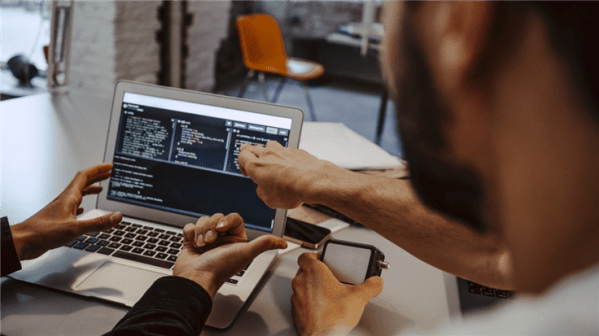 programmers working on a project together
