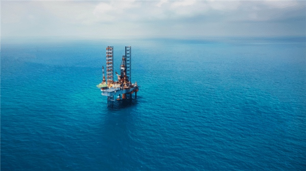 oil rig in a large blue sea