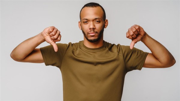 man showing two thumbs down
