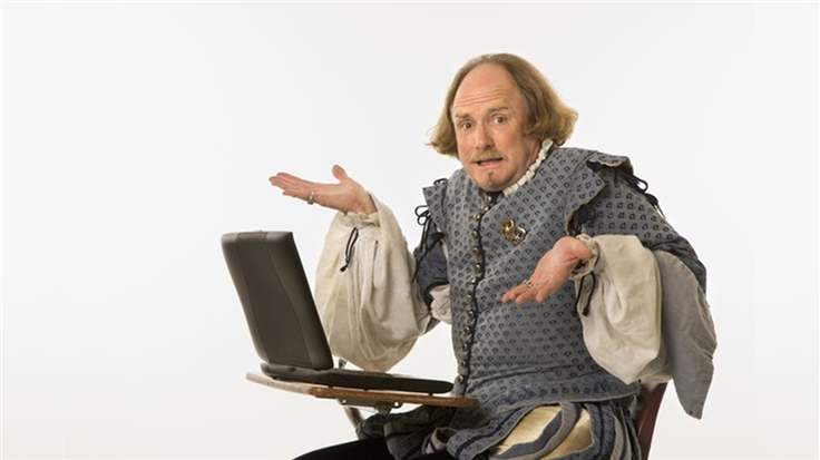 Shakespeare confused behind laptop