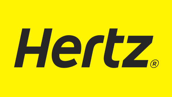 The brand name "Hertz" written in black, italicized, against a yellow backdrop