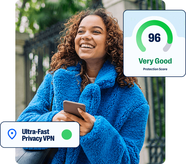 Woman in a blue fuzzy coat smiling near a park. overlays of the Malwarebytes interface showing VPN and a 96 out of 100 security score
