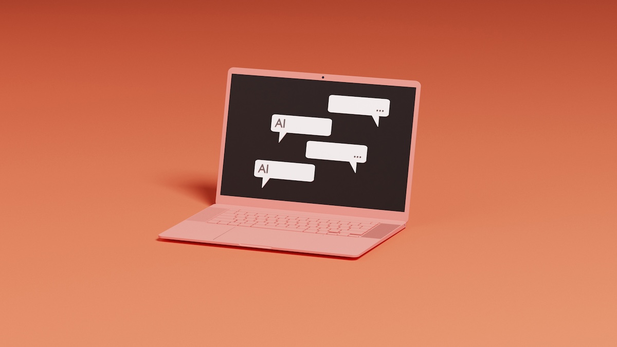A laptop shows a screen of traded text messages between a user and an AI chatbot